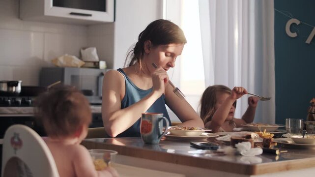 Mother Talking with Children During Breakfast Warm Family Moment at Home