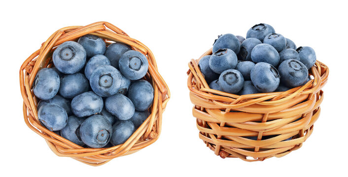 blueberry in wicker basket isolated on white background. Top view. Flat lay.