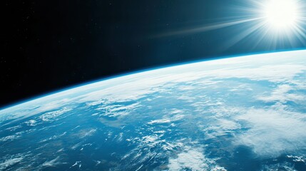 Obraz premium Planet earth illuminated by sunrise, seen from orbit with a glowing blue atmosphere, swirling white clouds and the dark expanse of deep space beyond