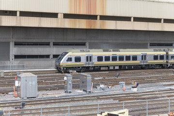 Naklejka premium Union Pearson Express traveling in the Union Station Rail Corridor, Toronto