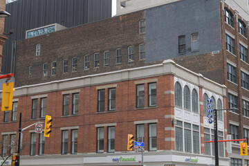 Naklejka premium exterior building and sign of easyfinancial Services, a loan agency, located at 221 Yonge St (corner of Shuter St), Toronto (John E. Thompson Block, 1886)