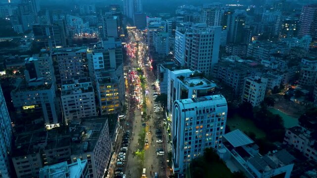4K drone shot of Dhaka city buildings and busy roads from above