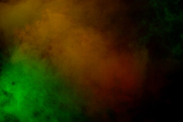 Fototapeta premium Orange and red steam on a black background.