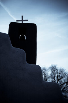 Adobe church silhouette at Taos Pueblo, New Mexico