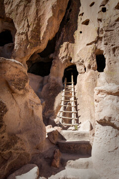 Cliff dwelling with wooden ladder at Bandelier National Monument
