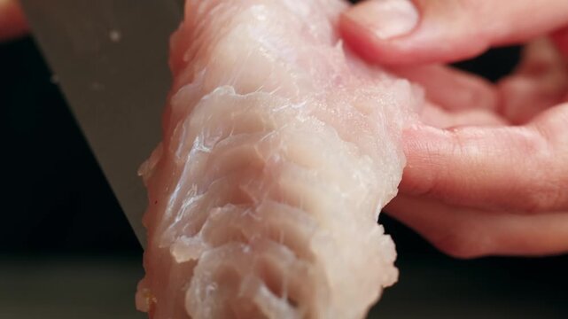 Cooking fish Peruvian ceviche close-up. Fresh cooked ceviche made of raw white fish. Traditional Peruvian cuisine. Cooking seafood dish.