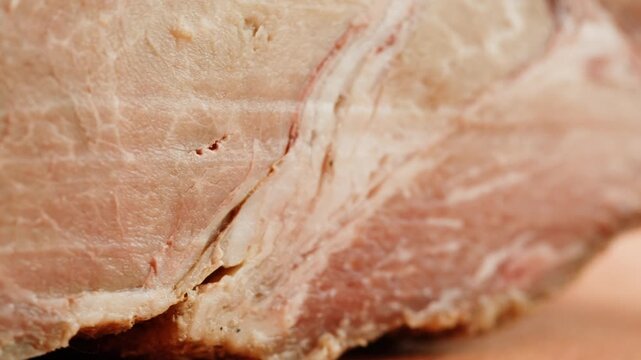 Pork shoulder roast, Juicy roasted pork belly sliced thick and served food in slavic cafe restaurant, spanish traditional christmas meat close up, chef slicing fat beef.