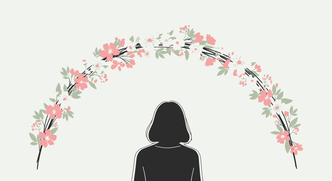 Woman in silhouette under floral arch.