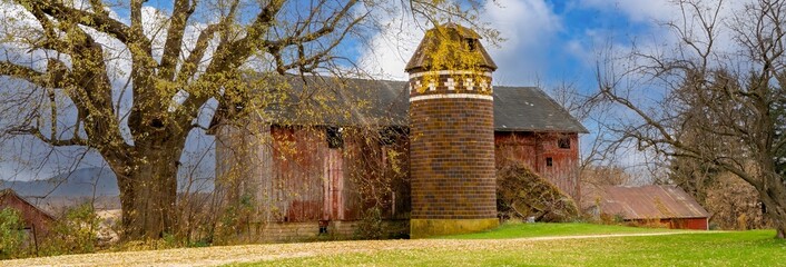 Very old vintage brick  silo and character barn © Bob