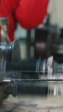 Producing of fiberglass reinforcement - machine is spinning the optical fiber wire