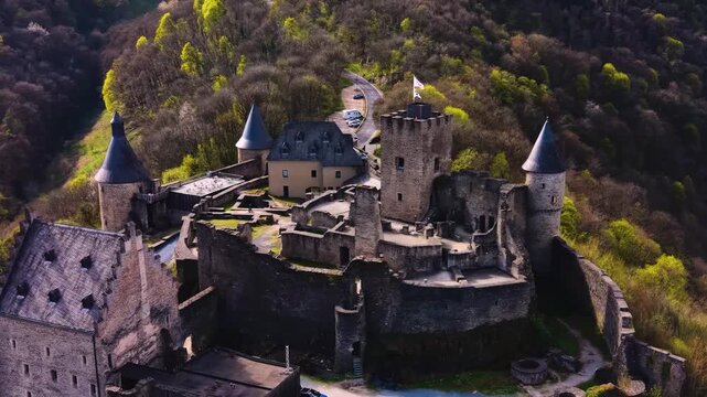 A panoramic Aerial view of the city and castle Clervaux in Luxembourg, on a sunny spring noon