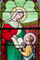 Fototapeta premium Stained glass (19th century) of Virgin Mary with her mother St. Anne.