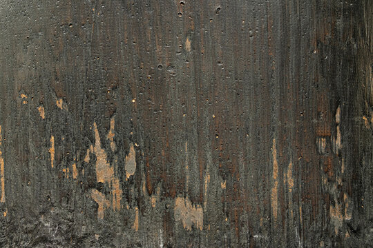 Black burnt skin of spacecraft texture as background
