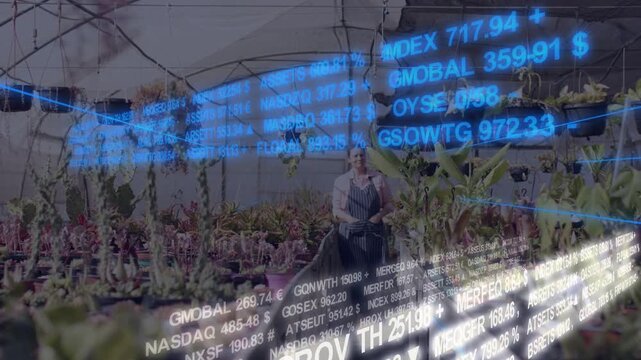 Nursery worker walking aisle, tending pots as finance tickers appearing around her for sales