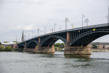 Fototapeta premium Scenic view of the Rhine River with the Theodor Heuss Bridge crossing the water near Mainz city center. Mainz, Rhineland-Palatinate, Germany