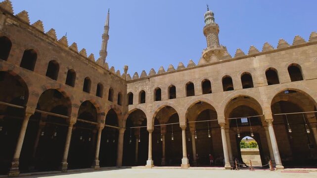 Slow horizontal camera movement across a historic mosque courtyard in Cairo, Egypt, captured in cinematic 4K during travel.