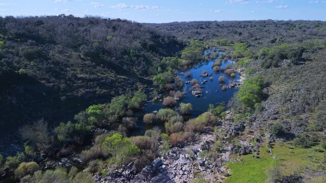 Aerial drone view of the area where the Huebra and Yeltes rivers meet, a springtime landscape in the Abadengo region of Salamanca province, Castile and Le&oacute;n, Spain, Europe