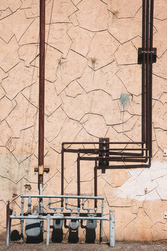 Utility meters in rundown urban alley