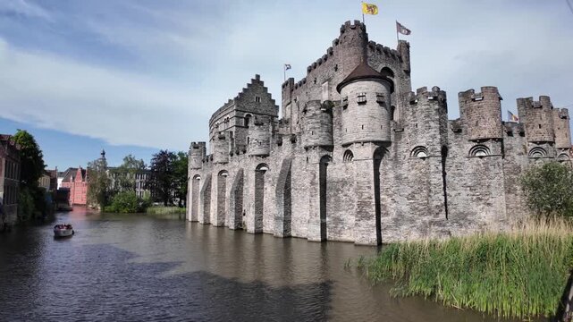 Gravensteen Castle by Canal in Ghent Belgium