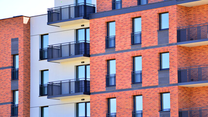 Obraz premium Downtown modern residential architecture. Architectural details of modern apartment building. Modern european residential apartment building complex.
