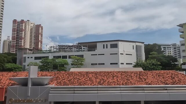 Train window of suburban Singapore
