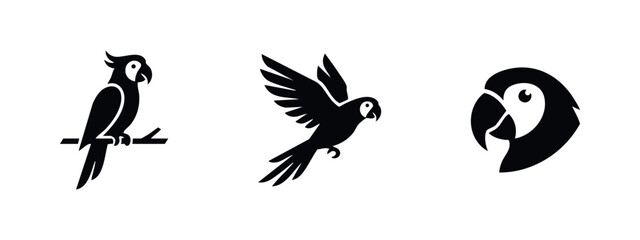 Minimalist black parrot silhouette icon set featuring a perched bird, a macaw in flight, and a parrot head profile on a white background. © Lili