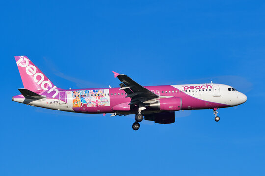 Peach Airbus A320-200 (JA827P) "Hirogaru Sky! Precure Jet" special livery passenger plane landing approach at Narita Airport.