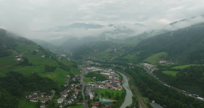 Aerial view of Chiusa on a cloudy day, Italy