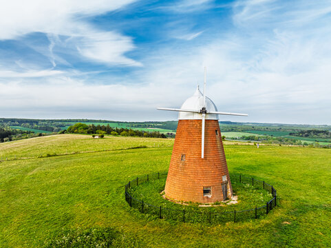 Fields and Farms over Halnaker Hill and the Windmill Trail from a drone, Boxgrove Village, West Sussex, England