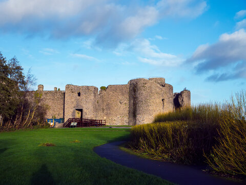Stunning old fortress castle in Roscommon town, Ireland. Famous tourist attraction with nice green park and amazing view. Powerful stone wall and towers to protect important people. Irish history.
