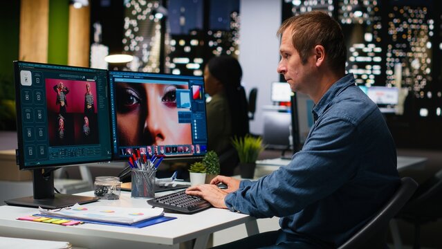 Male skilled editor using AI chatbot turning text prompt into photos and retouching, adjusting color to ensure professional content for clients. AI powered image editing, creative industry. Camera B.