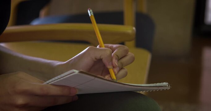 Writing in notepad with pencil 4k

