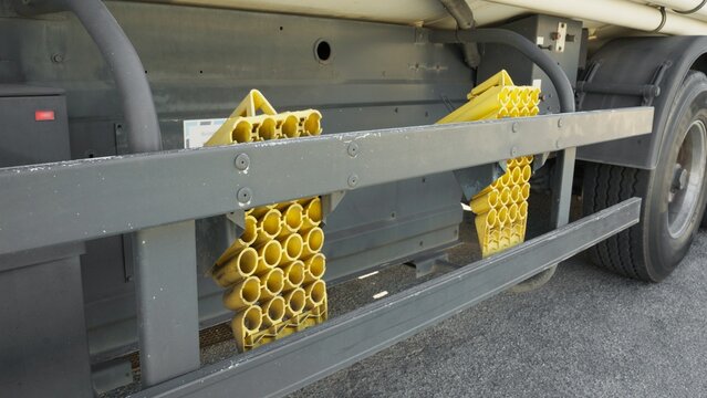 yellow wheel chock on tanker truck