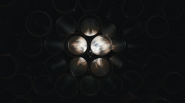 Stacked drainage sewer pipes inside view close up camera movement