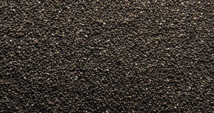 Chia seeds close up studio shot over rotating
