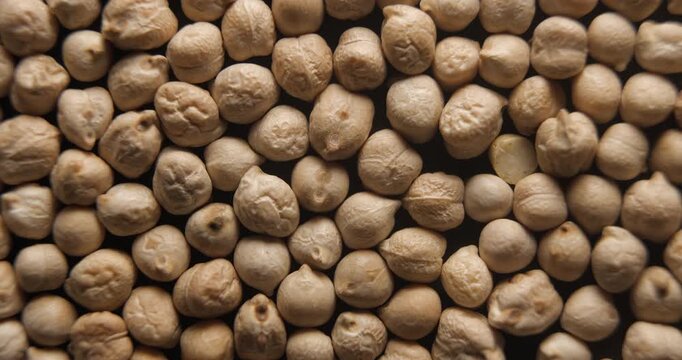 Dried chickpeas close up studio shot over rotating