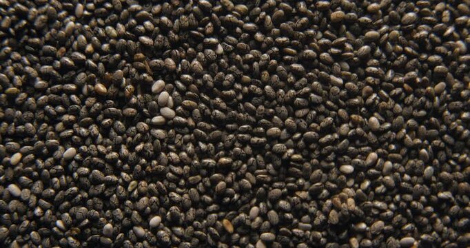 Chia seeds close up studio shot over rotating