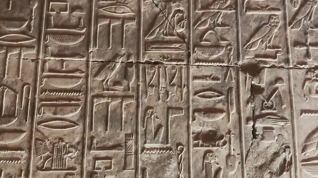 Beautiful bas-reliefs and ancient hieroglyphs in the Temple of Seti I in Abydos, Egypt.