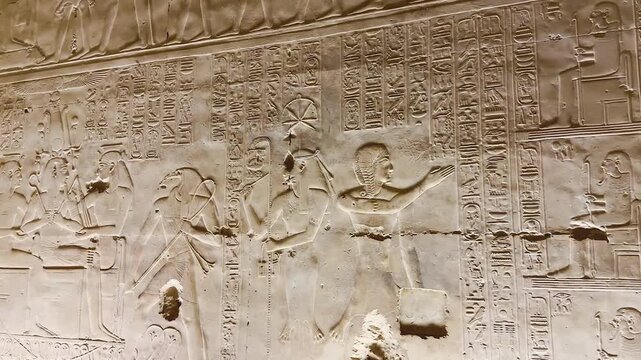 Beautiful bas-reliefs and ancient hieroglyphs in the Temple of Seti I in Abydos, Egypt.