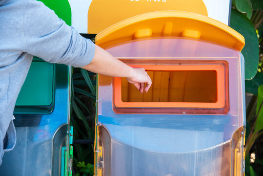 Reuse, reduce, recycle sorting process sustainable lifestyle rubbish dustbin plastic box in green garden. . Trash cans for sorting garbage recycle bin waste plastic container collection