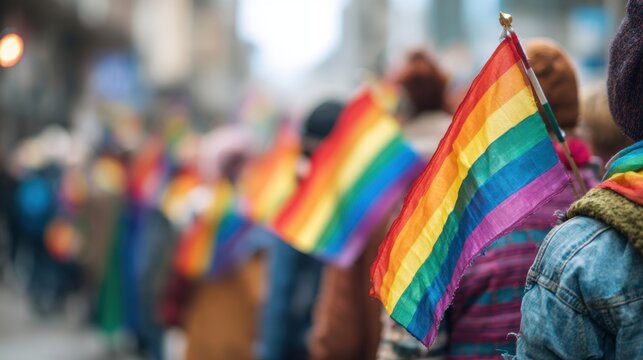close up Group of young activist for lgbt rights with rainbow flag, lesbian, rainbow, freedom, diversity, bisexual, gay, celebration, community