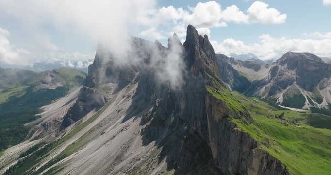 Clouds at Seceda summit in the Dolomites, Italy