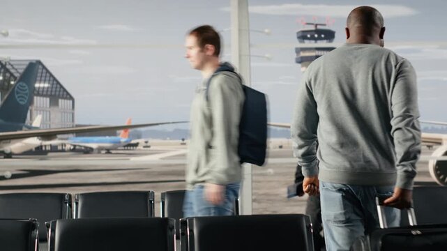 Walking, carrying trolleys and travelers in busy airport departure terminal. Preparing to fly home, luggage and people navigating through metal benches rows during holiday rush