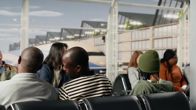 Complaining, plane being late and angry tourists in airport making exasperated phone calls. Berating airline company, tedious waiting and passengers irked by canceled flights announcement