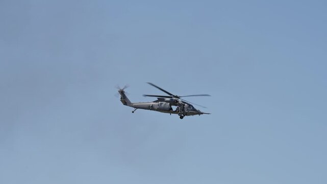 UH-60 Black Hawk Helicopter Door Gunner  Tracking Shot