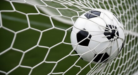 Fototapeta premium Soccer ball in the net, goal scored