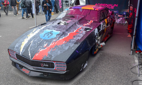 High-performance professional drag racing car Kharacternyk ProMod class featuring a unique custom livery with traditional Ukrainian folklore artwork (Cossack sorcerer)