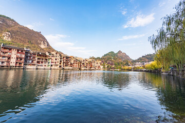 Fototapeta premium Panoramic Winter Sunset Scenery of Zhenyuan Ancient Town in Qiandongnan, Guizhou, China
