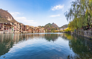 Fototapeta premium Panoramic Winter Sunset Scenery of Zhenyuan Ancient Town in Qiandongnan, Guizhou, China