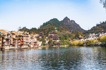 Fototapeta premium Panoramic Winter Sunset Scenery of Zhenyuan Ancient Town in Qiandongnan, Guizhou, China